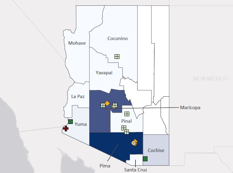 Map presenting top defense contract spending locations within the state of Arizona with an overlay showing the positions of key military installations differentiated by service and active/reserve affiliation.