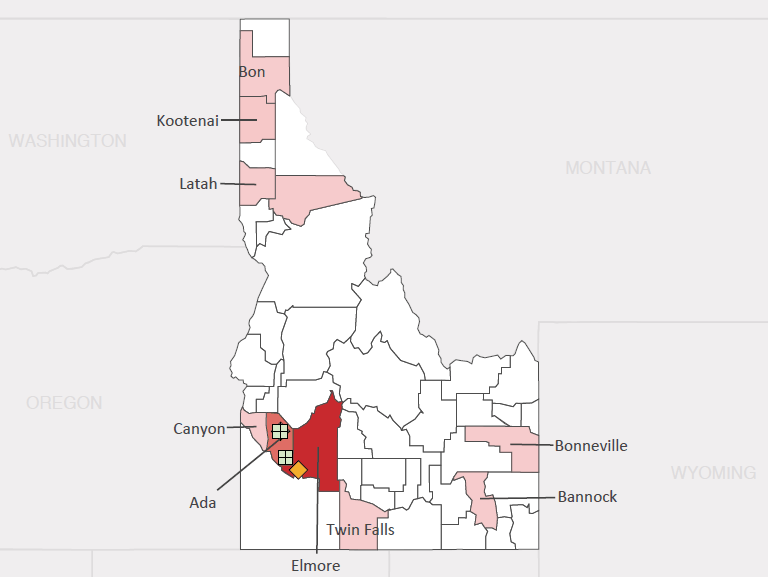 Map presenting top defense personnel spending locations within the state of Idaho with an overlay showing the positions of key military installations differentiated by service and active/reserve affiliation.