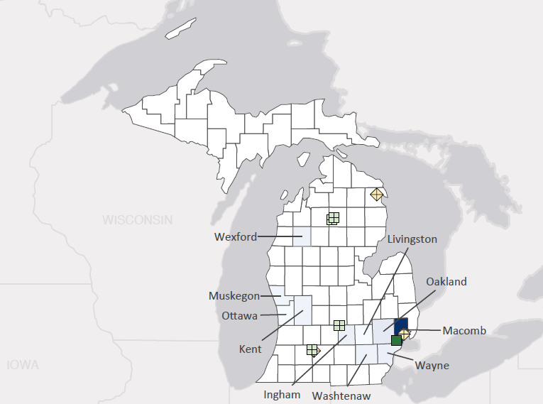 Map presenting top defense contract spending locations within the state of Michigan with an overlay showing the positions of key military installations differentiated by service and active/reserve affiliation.