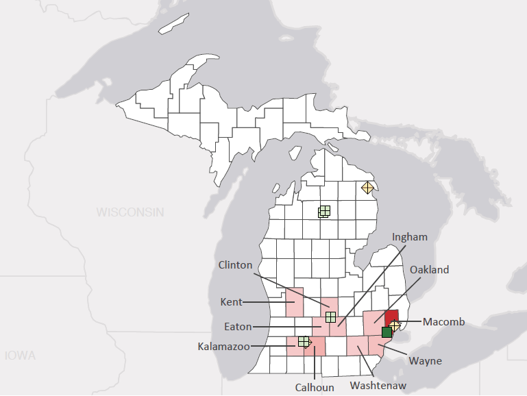 Map presenting top defense personnel spending locations within the state of Michigan with an overlay showing the positions of key military installations differentiated by service and active/reserve affiliation.