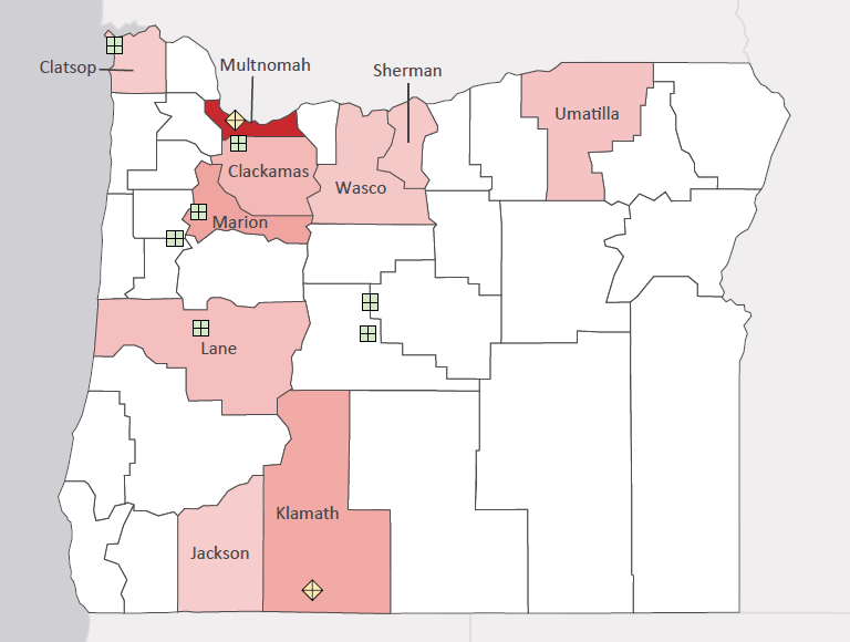 Map presenting top defense personnel spending locations within the state of Oregon with an overlay showing the positions of key military installations differentiated by service and active/reserve affiliation.