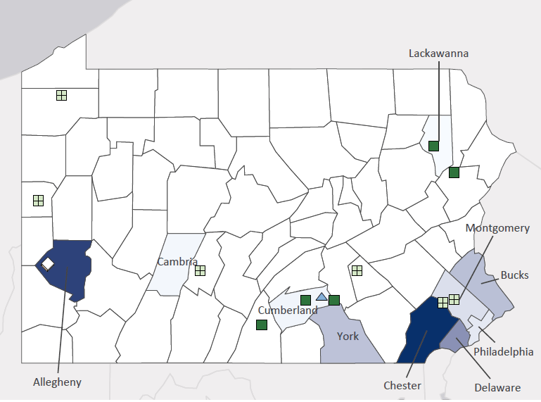 Map presenting top defense contract spending locations within the state of Pennsylvania with an overlay showing the positions of key military installations differentiated by service and active/reserve affiliation.