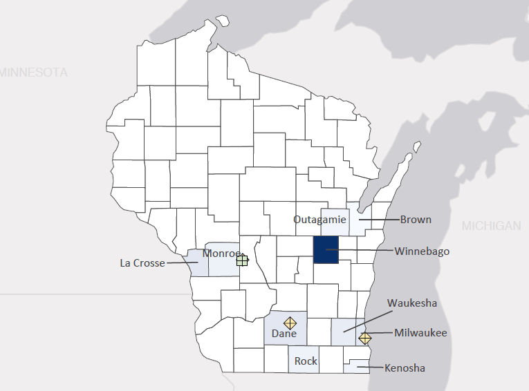 Map presenting top defense contract spending locations within the state of Wisconsin with an overlay showing the positions of key military installations differentiated by service and active/reserve affiliation.