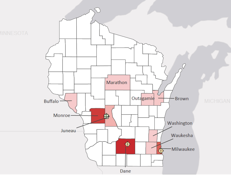 Map presenting top defense personnel spending locations within the state of Wisconsin with an overlay showing the positions of key military installations differentiated by service and active/reserve affiliation.