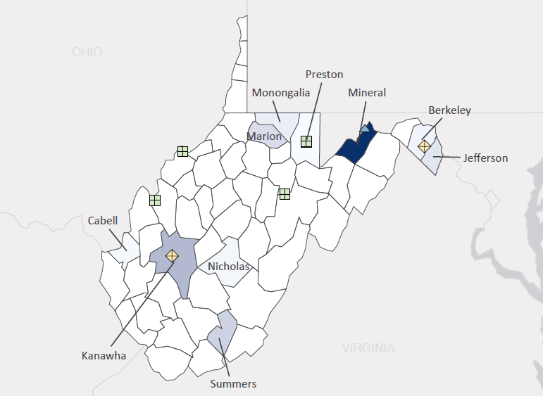 Map presenting top defense contract spending locations within the state of West Virginia with an overlay showing the positions of key military installations differentiated by service and active/reserve affiliation.