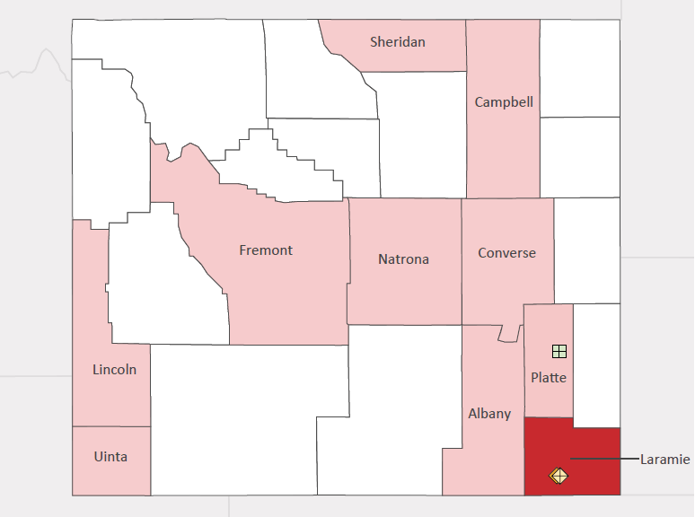 Map presenting top defense personnel spending locations within the state of Wyoming with an overlay showing the positions of key military installations differentiated by service and active/reserve affiliation.